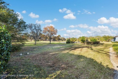 Welcome to your bright and cheerful haven in the heart of on Heather Golf and Country Club in Florida - for sale on GolfHomes.com, golf home, golf lot