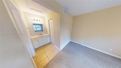 Spacious luxury condo on the north side of Sunrise Lakes Blvd on Sunrise Lakes Phase III in Florida - for sale on GolfHomes.com, golf home, golf lot