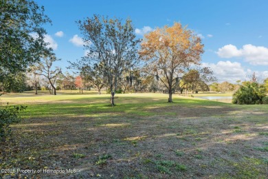 Welcome to your bright and cheerful haven in the heart of on Heather Golf and Country Club in Florida - for sale on GolfHomes.com, golf home, golf lot