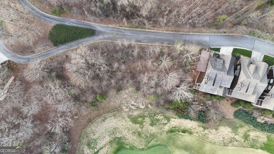 Tucked away on a quiet, no-outlet street with minimal traffic on Waterfall Country Club in Georgia - for sale on GolfHomes.com, golf home, golf lot