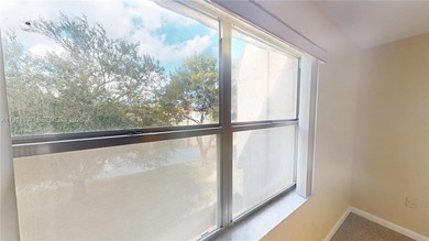 Spacious luxury condo on the north side of Sunrise Lakes Blvd on Sunrise Lakes Phase III in Florida - for sale on GolfHomes.com, golf home, golf lot