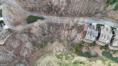 Tucked away on a quiet, no-outlet street with minimal traffic on Waterfall Country Club in Georgia - for sale on GolfHomes.com, golf home, golf lot