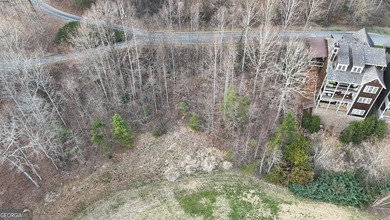 Tucked away on a quiet, no-outlet street with minimal traffic on Waterfall Country Club in Georgia - for sale on GolfHomes.com, golf home, golf lot