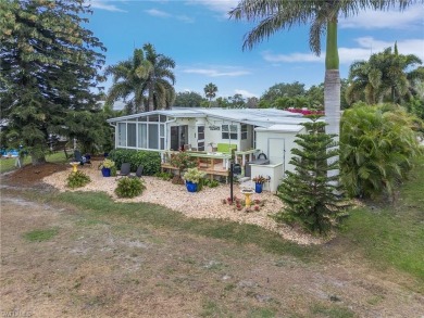 Enjoy outdoor entertaining? This home is tucked away on a on Riviera Golf Club in Florida - for sale on GolfHomes.com, golf home, golf lot