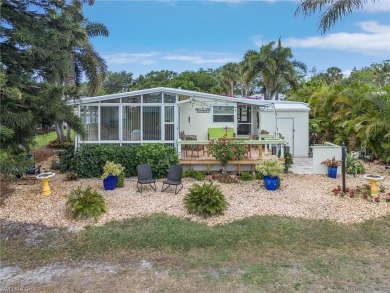 Enjoy outdoor entertaining? This home is tucked away on a on Riviera Golf Club in Florida - for sale on GolfHomes.com, golf home, golf lot