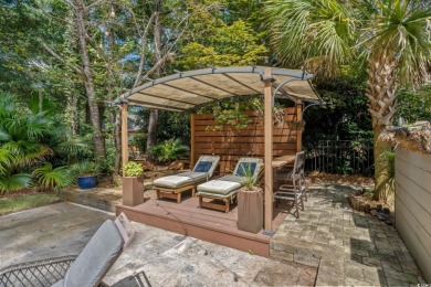 This well-kept brick ranch sits in one of Pawleys Island's most on Heritage Club in South Carolina - for sale on GolfHomes.com, golf home, golf lot