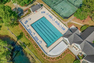 This well-kept brick ranch sits in one of Pawleys Island's most on Heritage Club in South Carolina - for sale on GolfHomes.com, golf home, golf lot