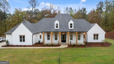 EXPERIENCE A PERFECT BLEND OF LUXURY, COMFORT, AND BREATHTAKING on Harbor Club Golf and Country Club in Georgia - for sale on GolfHomes.com, golf home, golf lot