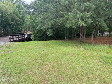 Prime Corner Lot in Prestigious Winding River Plantation - on Carolina National Golf Club in North Carolina - for sale on GolfHomes.com, golf home, golf lot