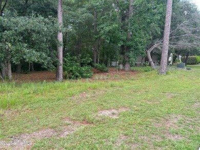 Prime Corner Lot in Prestigious Winding River Plantation - on Carolina National Golf Club in North Carolina - for sale on GolfHomes.com, golf home, golf lot