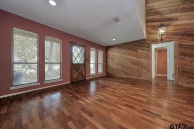 Step inside this charming single-story cottage and discover the on Hide-A-Way Lake Golf Course in Texas - for sale on GolfHomes.com, golf home, golf lot