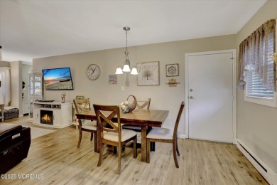 Updated & move-in ready, this 2 BR, 2 Bath home with a one car on Greenbriar Woodlands in New Jersey - for sale on GolfHomes.com, golf home, golf lot