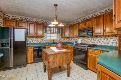 Welcome to 137 Maxwell Dr-- a charming, colonial style residence on Country Club of Bristol in Tennessee - for sale on GolfHomes.com, golf home, golf lot