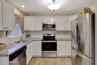 Updated & move-in ready, this 2 BR, 2 Bath home with a one car on Greenbriar Woodlands in New Jersey - for sale on GolfHomes.com, golf home, golf lot