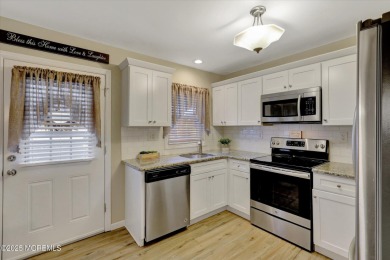 Updated & move-in ready, this 2 BR, 2 Bath home with a one car on Greenbriar Woodlands in New Jersey - for sale on GolfHomes.com, golf home, golf lot