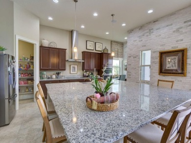 Step into luxury living in the heart of Lake Nona's prestigious on Eagle Creek Golf Club in Florida - for sale on GolfHomes.com, golf home, golf lot