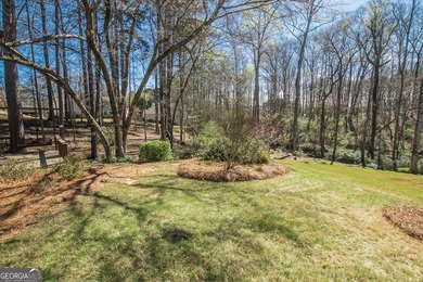 Welcome to 1029 Stone Creek Lane! This adorable 3 bedroom/2 bath on Monroe Golf and Country Club in Georgia - for sale on GolfHomes.com, golf home, golf lot