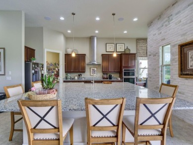 Step into luxury living in the heart of Lake Nona's prestigious on Eagle Creek Golf Club in Florida - for sale on GolfHomes.com, golf home, golf lot