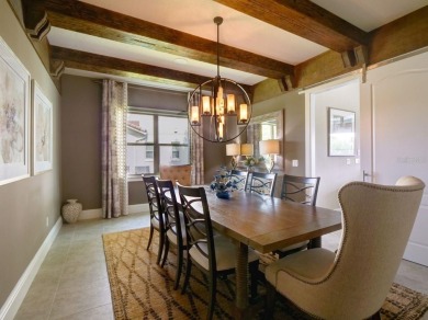 Step into luxury living in the heart of Lake Nona's prestigious on Eagle Creek Golf Club in Florida - for sale on GolfHomes.com, golf home, golf lot