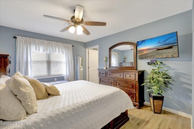 Updated & move-in ready, this 2 BR, 2 Bath home with a one car on Greenbriar Woodlands in New Jersey - for sale on GolfHomes.com, golf home, golf lot