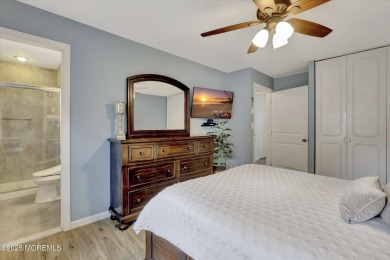 Updated & move-in ready, this 2 BR, 2 Bath home with a one car on Greenbriar Woodlands in New Jersey - for sale on GolfHomes.com, golf home, golf lot
