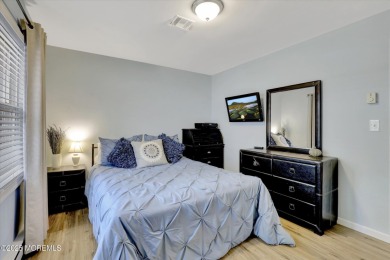 Updated & move-in ready, this 2 BR, 2 Bath home with a one car on Greenbriar Woodlands in New Jersey - for sale on GolfHomes.com, golf home, golf lot