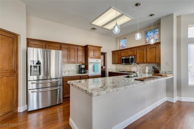 Nestled in a quiet cul-de-sac in Sun City Summerlin, this home on Highland Falls Golf Club in Nevada - for sale on GolfHomes.com, golf home, golf lot