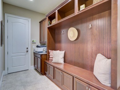 Step into luxury living in the heart of Lake Nona's prestigious on Eagle Creek Golf Club in Florida - for sale on GolfHomes.com, golf home, golf lot