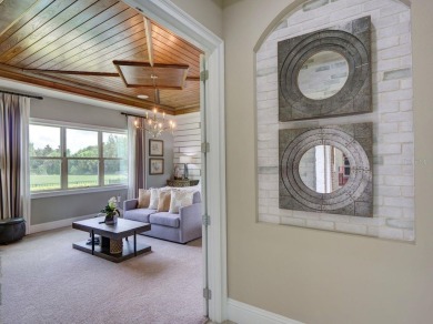 Step into luxury living in the heart of Lake Nona's prestigious on Eagle Creek Golf Club in Florida - for sale on GolfHomes.com, golf home, golf lot