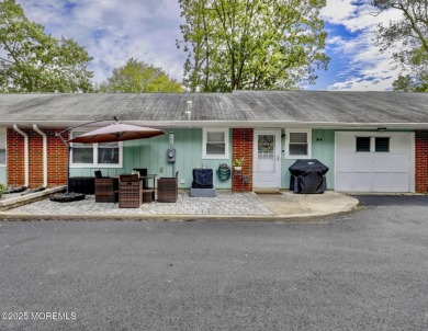 Updated & move-in ready, this 2 BR, 2 Bath home with a one car on Greenbriar Woodlands in New Jersey - for sale on GolfHomes.com, golf home, golf lot
