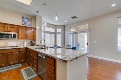 Nestled in a quiet cul-de-sac in Sun City Summerlin, this home on Highland Falls Golf Club in Nevada - for sale on GolfHomes.com, golf home, golf lot