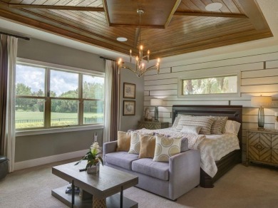Step into luxury living in the heart of Lake Nona's prestigious on Eagle Creek Golf Club in Florida - for sale on GolfHomes.com, golf home, golf lot