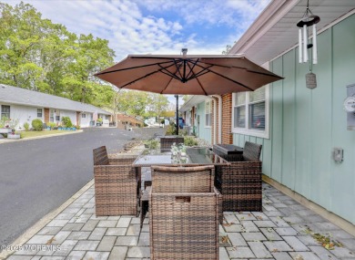 Updated & move-in ready, this 2 BR, 2 Bath home with a one car on Greenbriar Woodlands in New Jersey - for sale on GolfHomes.com, golf home, golf lot