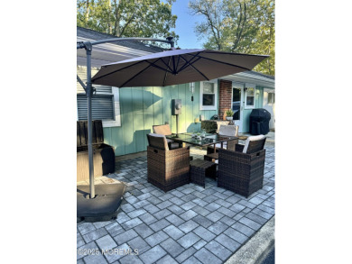 Updated & move-in ready, this 2 BR, 2 Bath home with a one car on Greenbriar Woodlands in New Jersey - for sale on GolfHomes.com, golf home, golf lot