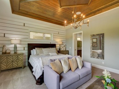Step into luxury living in the heart of Lake Nona's prestigious on Eagle Creek Golf Club in Florida - for sale on GolfHomes.com, golf home, golf lot