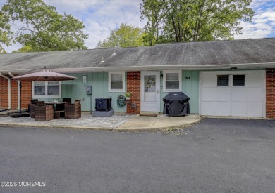 Updated & move-in ready, this 2 BR, 2 Bath home with a one car on Greenbriar Woodlands in New Jersey - for sale on GolfHomes.com, golf home, golf lot