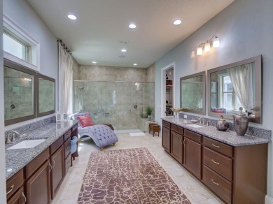 Step into luxury living in the heart of Lake Nona's prestigious on Eagle Creek Golf Club in Florida - for sale on GolfHomes.com, golf home, golf lot