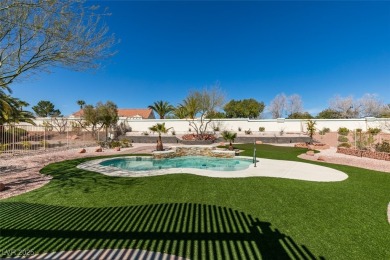 Nestled in a quiet cul-de-sac in Sun City Summerlin, this home on Highland Falls Golf Club in Nevada - for sale on GolfHomes.com, golf home, golf lot