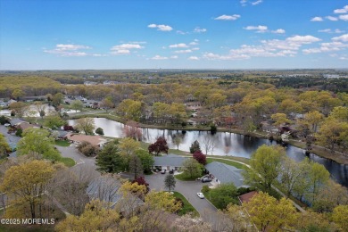 Updated & move-in ready, this 2 BR, 2 Bath home with a one car on Greenbriar Woodlands in New Jersey - for sale on GolfHomes.com, golf home, golf lot