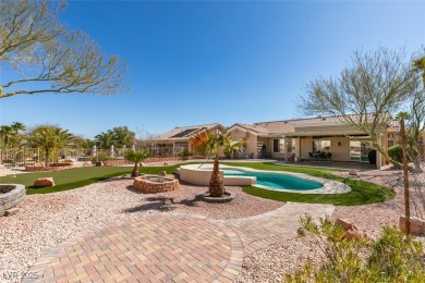 Nestled in a quiet cul-de-sac in Sun City Summerlin, this home on Highland Falls Golf Club in Nevada - for sale on GolfHomes.com, golf home, golf lot