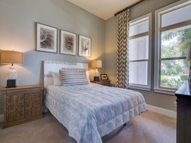 Step into luxury living in the heart of Lake Nona's prestigious on Eagle Creek Golf Club in Florida - for sale on GolfHomes.com, golf home, golf lot