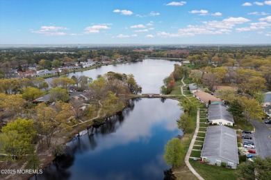 Updated & move-in ready, this 2 BR, 2 Bath home with a one car on Greenbriar Woodlands in New Jersey - for sale on GolfHomes.com, golf home, golf lot