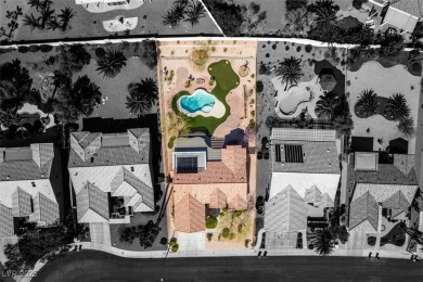 Nestled in a quiet cul-de-sac in Sun City Summerlin, this home on Highland Falls Golf Club in Nevada - for sale on GolfHomes.com, golf home, golf lot