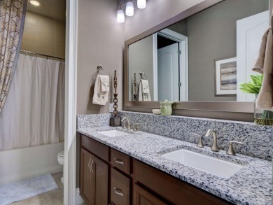 Step into luxury living in the heart of Lake Nona's prestigious on Eagle Creek Golf Club in Florida - for sale on GolfHomes.com, golf home, golf lot