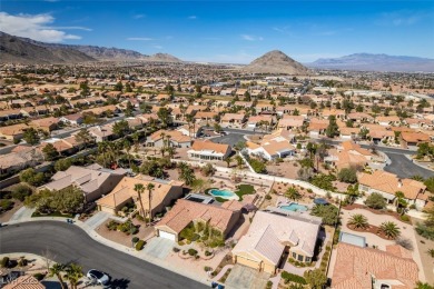 Nestled in a quiet cul-de-sac in Sun City Summerlin, this home on Highland Falls Golf Club in Nevada - for sale on GolfHomes.com, golf home, golf lot
