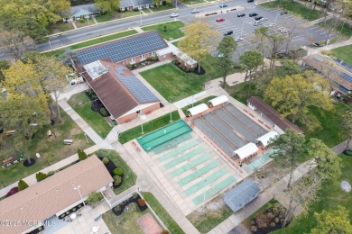 Updated & move-in ready, this 2 BR, 2 Bath home with a one car on Greenbriar Woodlands in New Jersey - for sale on GolfHomes.com, golf home, golf lot