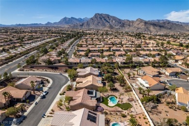 Nestled in a quiet cul-de-sac in Sun City Summerlin, this home on Highland Falls Golf Club in Nevada - for sale on GolfHomes.com, golf home, golf lot