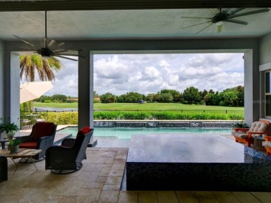 Step into luxury living in the heart of Lake Nona's prestigious on Eagle Creek Golf Club in Florida - for sale on GolfHomes.com, golf home, golf lot