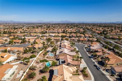 Nestled in a quiet cul-de-sac in Sun City Summerlin, this home on Highland Falls Golf Club in Nevada - for sale on GolfHomes.com, golf home, golf lot