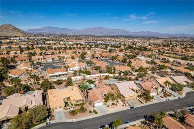 Nestled in a quiet cul-de-sac in Sun City Summerlin, this home on Highland Falls Golf Club in Nevada - for sale on GolfHomes.com, golf home, golf lot